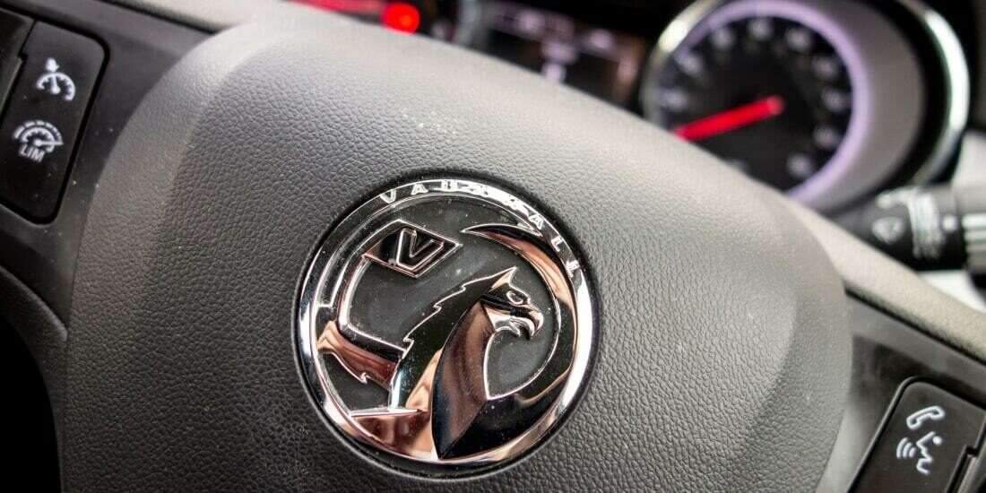 Vauxhall badge on steering wheel overlooking the dashboard