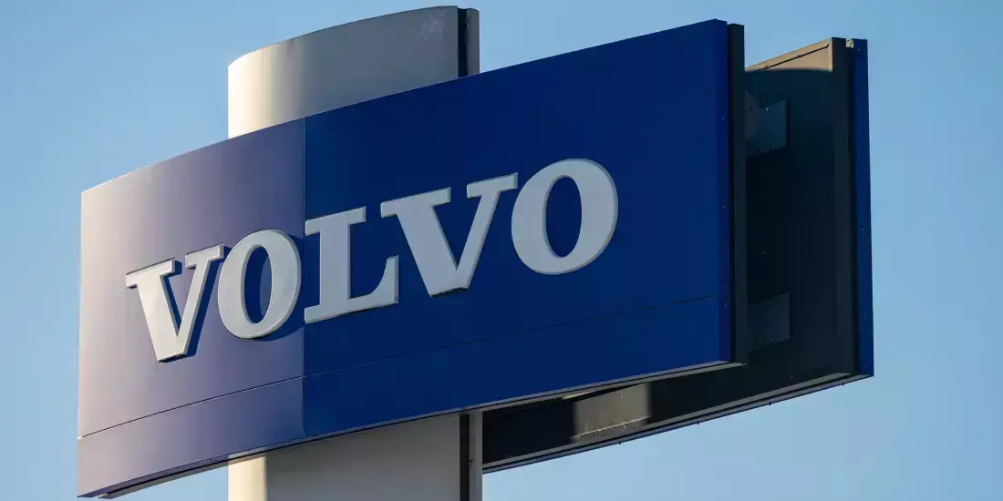 Blue Volvo sign on a pylon
