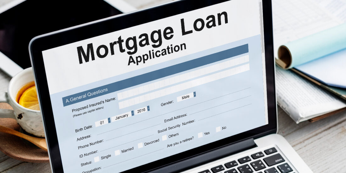 Mortgage application form on a laptop screen